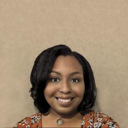 Pictured: Madison Cothern in front of a textured beige background