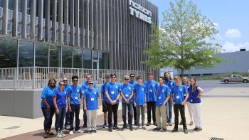 Students stand in front of Nokian Tire