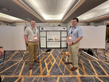 ChattState Honors Program students Benjamen L. and Elijah W. standing by a poster board for their presentation titled “Hydrology: Building Bridges to a Sustainable Future Amidst Climate Challenges.” 