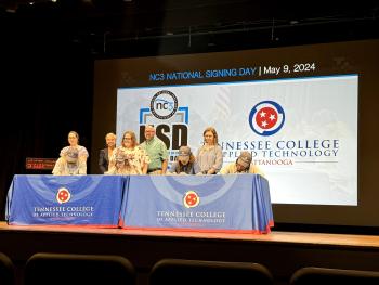 Students sign letters of intent during TCAT National Signing Day.