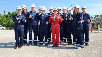 student group in uniforms and hardhats