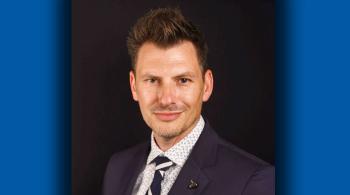 headshot of man in suit