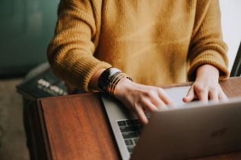 A person works at a computer.