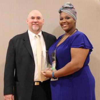 delnita evans with apca award