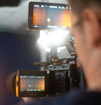 Pictured: A news camera in a television studio, via Harry Shelton, Unsplash
