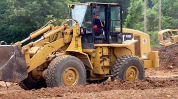 heavy equipment being used by students
