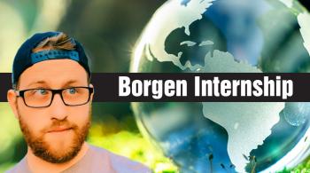 jake bolden looking at a world globe in a forest with the words borgen internship