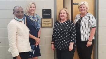 4 women in front of a classroom