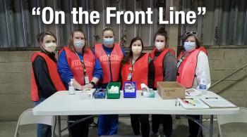 night nursing students with instructor at carta bus barn to give vaccinations