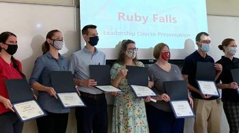 group of people with certificates