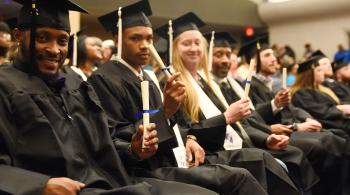 rows of graduates at a cermeony