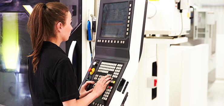 A woman uses an automated control system