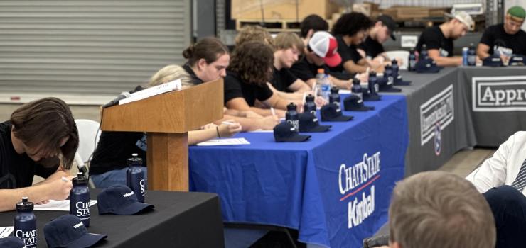 ChattState Apprenticeship Students signing at Valmont Apprenticeship Event
